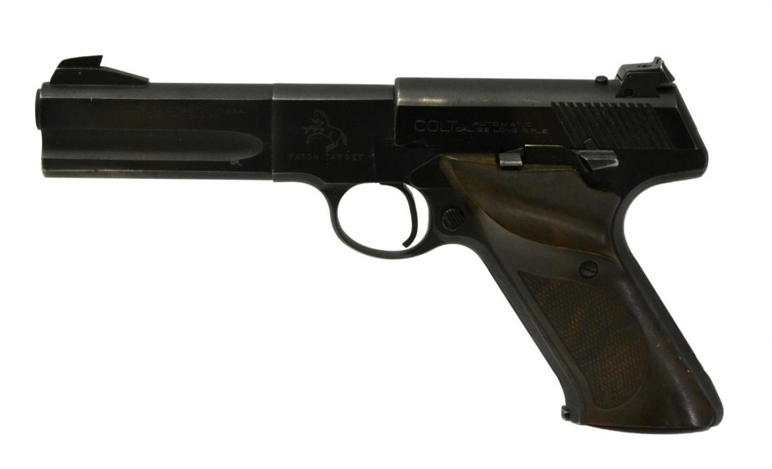 COLT WOODSMAN SERIES 2 MATCH TARGET PISTOL, 22LR: Colt Woodsman, Series 3, Match Target pistol, .22LR caliber, 4.5" barrel, Colt plastic checkered grips with thumb rest, Colt marked 10 round magazine, chip at base of left grip, together with custom m