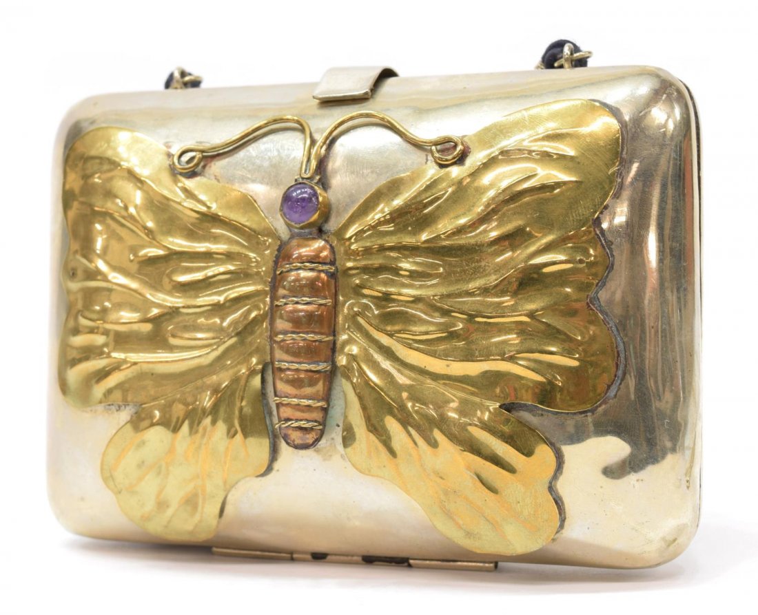 BRIAN HARMS SILVERPLATE & AMETHYST BUTTERFLY BAG: Vintage silverplate bag, signed on clasp Brian Harms, Mexico, the silver bag applied with a brass butterfly with amethyst cabochon head, black rope shoulder strap, 4.5"h, 6.25"w, 381 grams (inclusive 