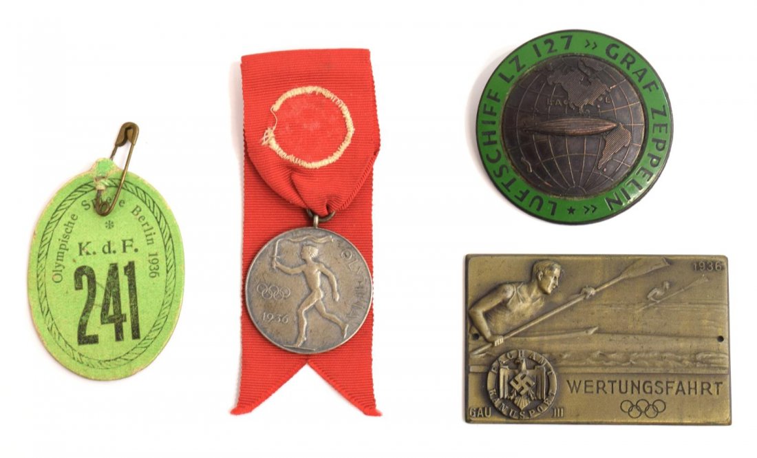 (4) 1936 GERMAN OLYMPICS MEDALS, ZEPPELIN BADGE: (lot of 3) German badges: (1) Graf Zeppelin green badge with convex zeppelin over the glove, 1.75"diameter; (1) 1936 Olympics plaque, Kayaking, "Wertungsfahrt" over five rings, at left the Nazi swasti