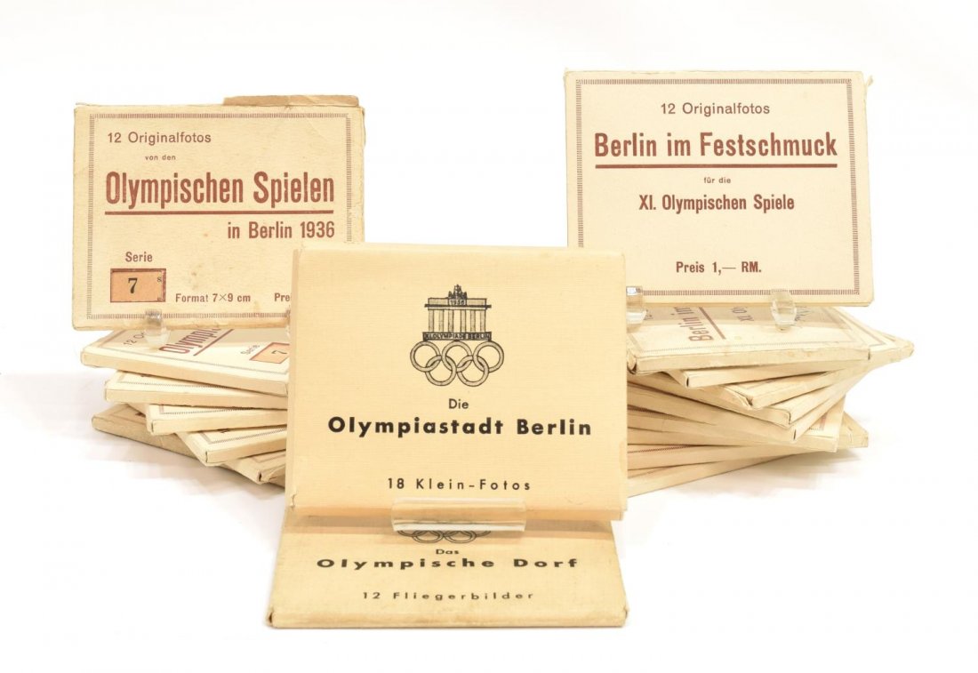 (lot) GERMAN OLYMPICS PHOTO CARDS & BERLIN SCENES: (collection) 1936 German Olympics photo cards, fifteen packs with game scenes, Hitler, events, stadium, medal winners, some multiples of same series; (4) packs of photos showing mostly Berlin scenes, 