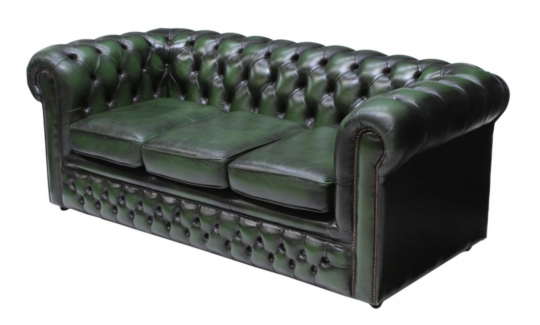 CHESTERFIELD GREEN LEATHER TUFTED SOFA: Chesterfield green leather sofa having buttoned and rolled back and arms, brass tack accents, moving on wheels, 29"h, 73.5"w, 34"d Start Price: $400.00