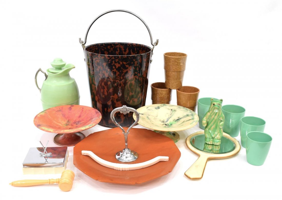 (16) MID-CENTURY TABLE TOP ARTICLES: (lot of 16) Collection of mid-century table top articles, comprising: (2) Bandalasta ware compotes, red and cream, 2.75"h, 7.5"w; (1) Manning-Bowman decagon toffee colored bakelite tray with chrome ce