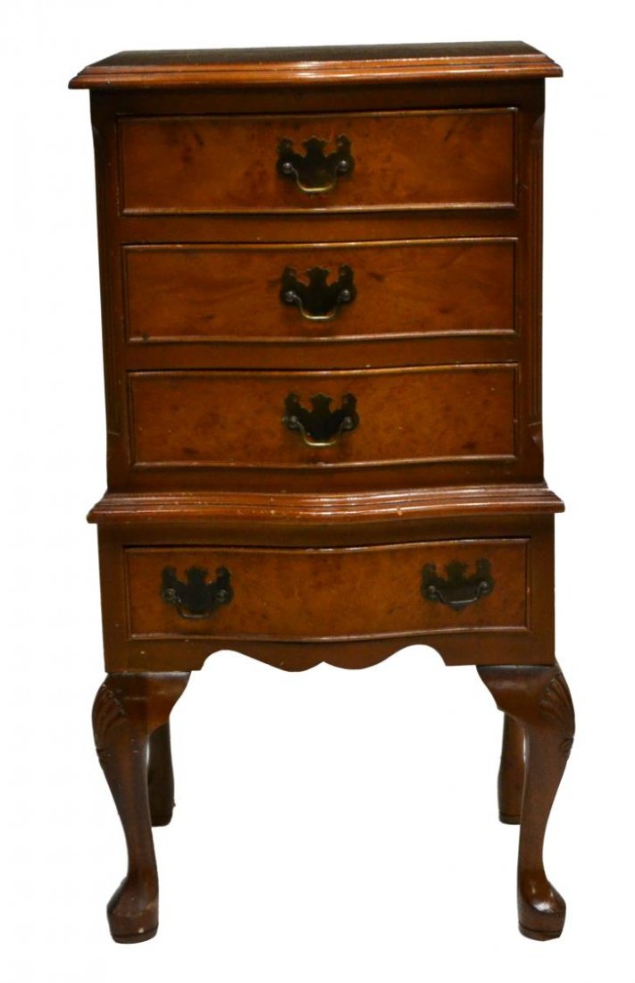 DIMINUTIVE QUEEN ANNE STYLE BURLWOOD CABINET: Diminutive English Queen Anne style burlwood cabinet, having four drawers over shell carved cabriole legs, approx 30"h, 15.75"w, 12"d Start Price: $150.00