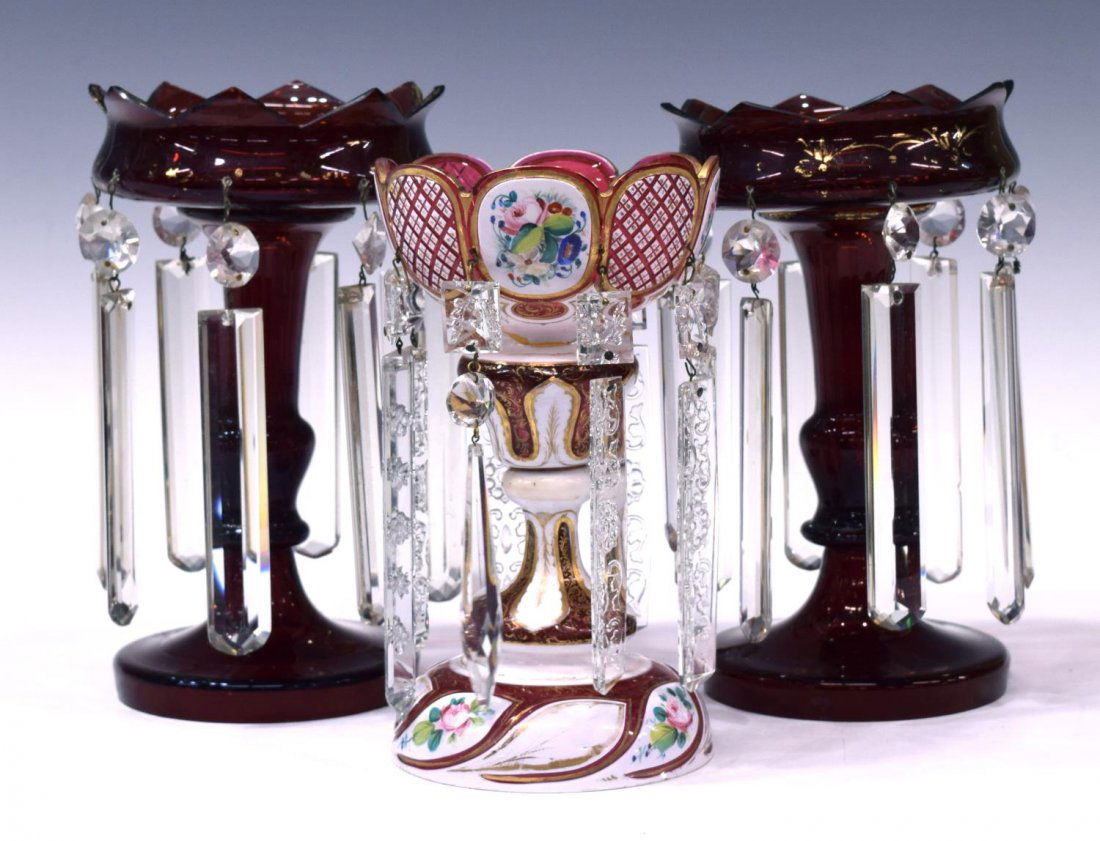 (3) VICTORIAN & BOHEMIAN ART GLASS MANTLE LUSTRES: (lot of 3) Victorian and Bohemian art glass mantle lusters, comprising: (2) red glass with pointed rims, parcel gilt accents, hung with cut and faceted prisms, some prisms having flakes, approx 8.75"h
