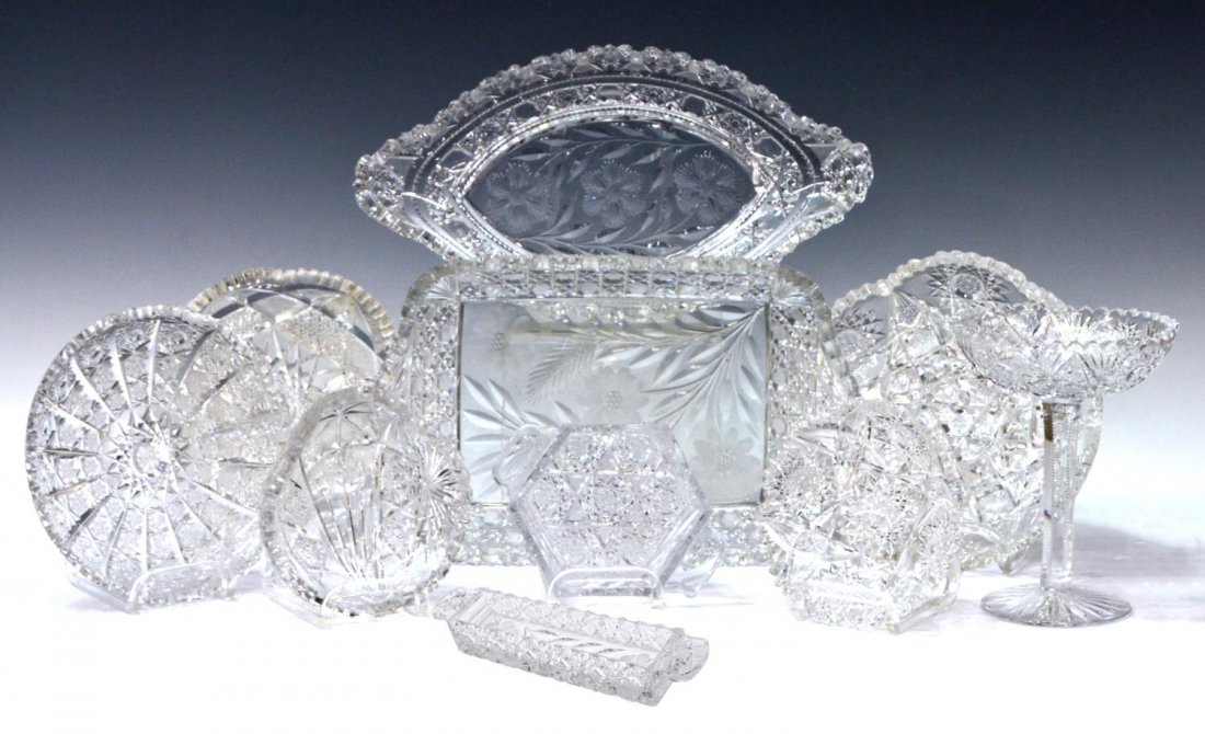 (10) AMERICAN & OTHER CUT GLASS TRAYS & TABLEWARE: (lot of 9) American and other cut glass tableware, including: (2) large floral cut trays, (one) of navette form with cane cut borders, 14"l, (one) octagonal hobnail trim enclosing bloomed floral stalk