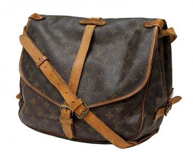 LOUIS VUITTON SAUMUR CROSSBODY MESSENGER BAG: Louis Vuitton "Saumur 30" cross body shoulder messenger bag, leather belts and adjustable strap, piping and trim, double canvas lined saddle bags, one with full length interior slip pocket, the other