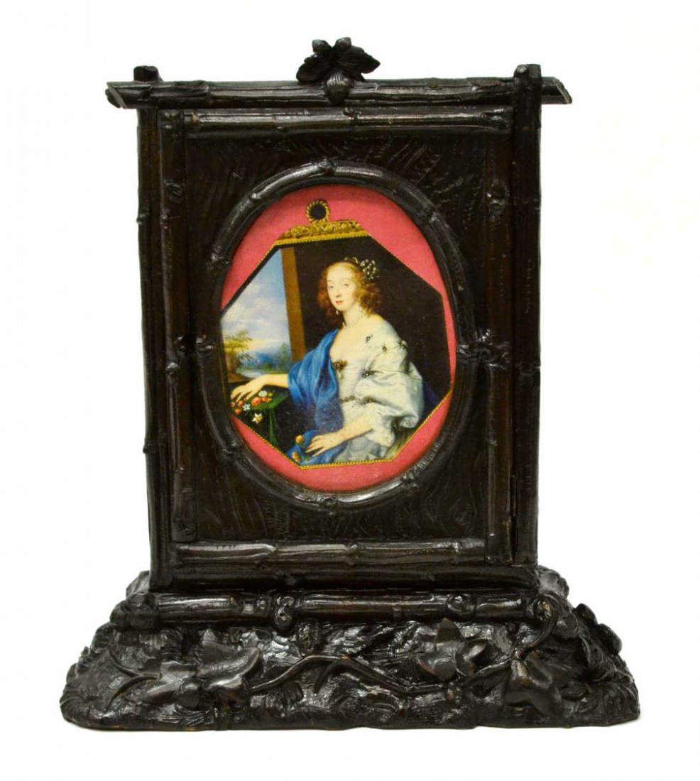 ANTIQUE ITALIAN CARVED WOOD KEY BOX, 19TH C.: Antique Italian key box, 19th c., wood frame carved as branches framing print of royal woman, leaf and flower accent base, front opens to purple cloth lined interior featuring seven key hooks, some we