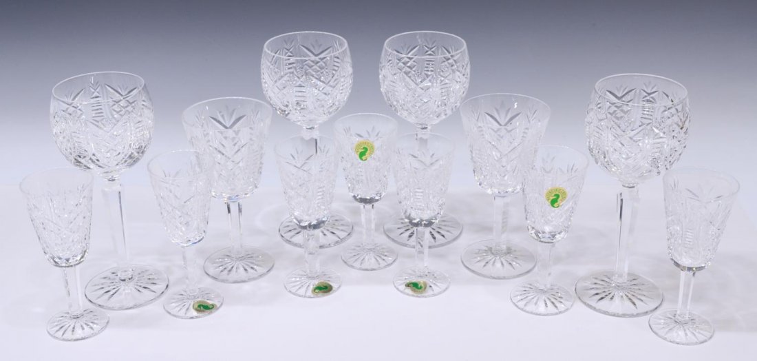 (13) WATERFORD CUT CRYSTAL CLARE STEMWARE: (lot of 13) Waterford cut crystal stemware, in the "Clare" pattern, comprising: (7) sherry glasses, five retaining makers sticker, approx 5"h; (2) water goblets, one retaining makers sticker, approx 5