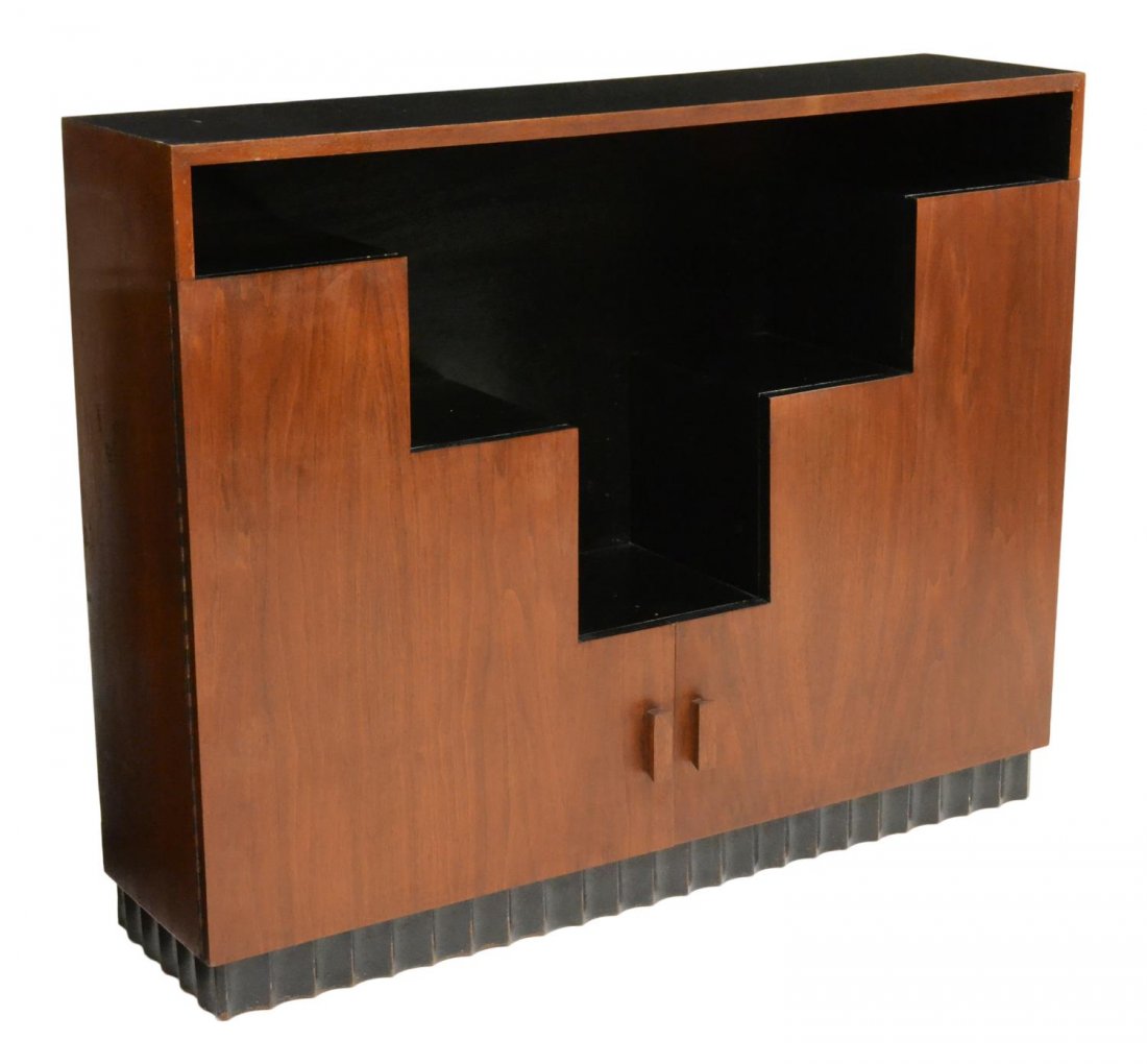 STEPPED CABINET IN THE MANNER OF PAUL FRANKL: Modern bookcase or cabinet, design in the manner of Paul T. Frankl (Austria, United States, 1886-1958), rectangular finished in dark teakwood and ebonized wood, stepped shelves over two doors opening 