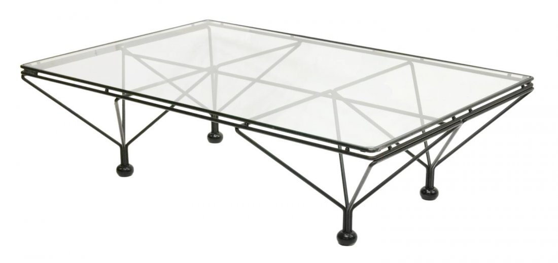 ITALIAN MID-CENTURY GLASS & IRON COFFEE TABLE: Italian mid-century modern glass and iron "Alanda" coffee table, in the style of Paolo Piva for B&B Italia (Italian B. 1954), a glass top over inverted pyramid base, 13.5"h, 47.25"w, 31.5"d Start Pric