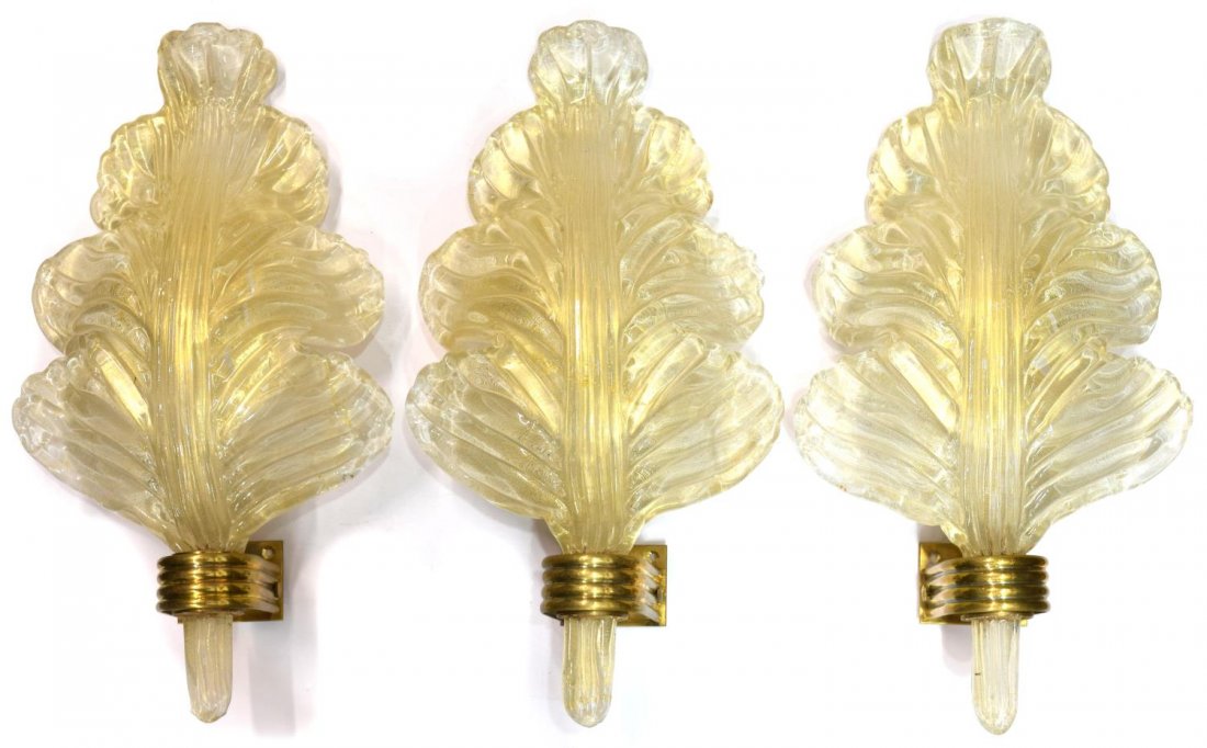 (3) BAROVIER & TOSO MURANO ART GLASS LEAF SCONCES: (lot of 3) Italian mid-century modern Murano art glass wall sconces, c.1950, design by Barovier and Toso, each having brass base with ribbed sides and single light socket, base holding large leaf form