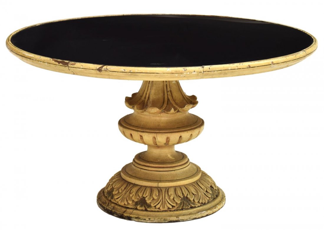 CARVED & PAINTED GLASS TOP COFFEE TABLE: Carved painted wood urn form pedestal coffee table with black glass inset top, glass marked AFGD, minor paint loss to edges, 17"h, 30" diam. *Provenance: Estate of Howard Hand (Texas, New York, 1921-2