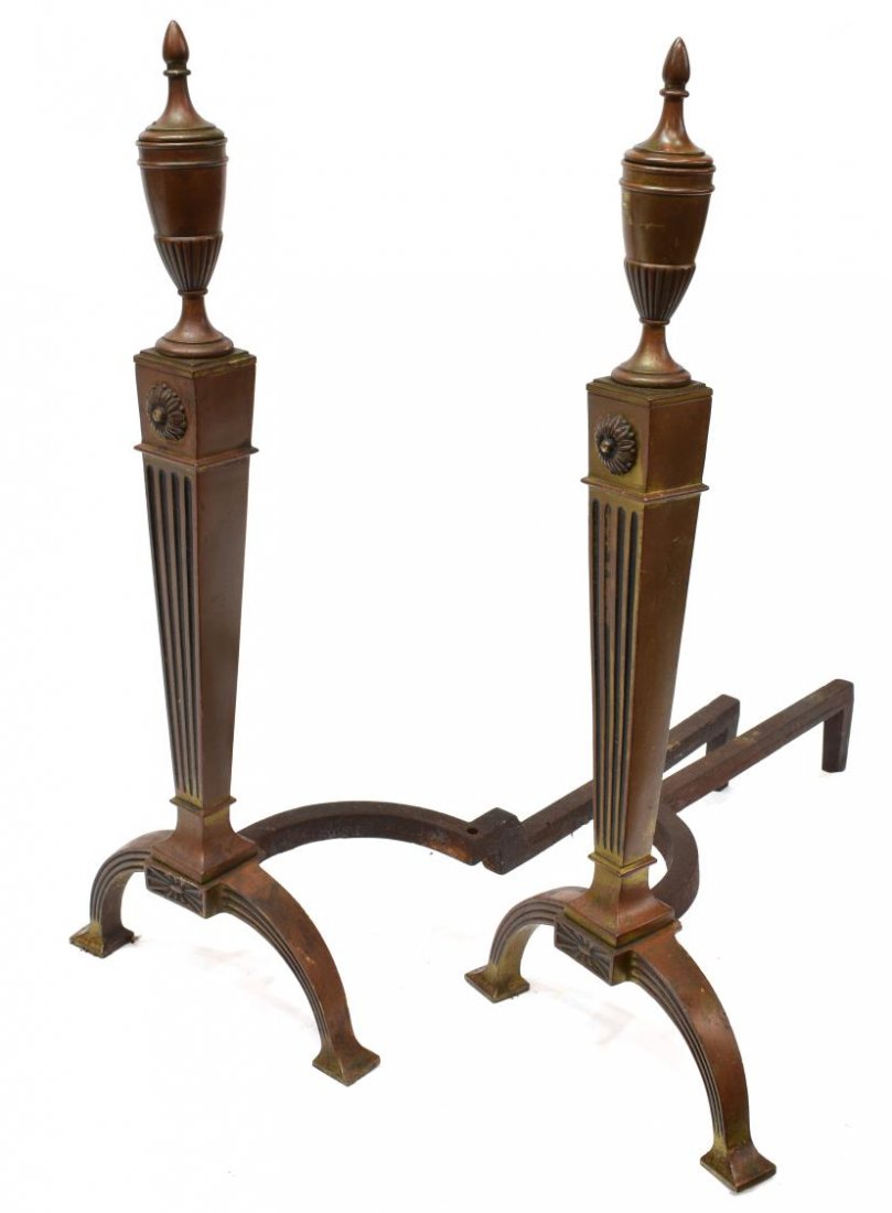 (2) NEOCLASSICAL STYLE URN TOP ANDIRONS: (pair) Neoclassical style bronze andirons, the urn form finial above a squared fluted column, rising on arched legs with squared feet, 25"h, 11"w, 22"d, 12lbs total *Provenance: Estate of Howard Hand 