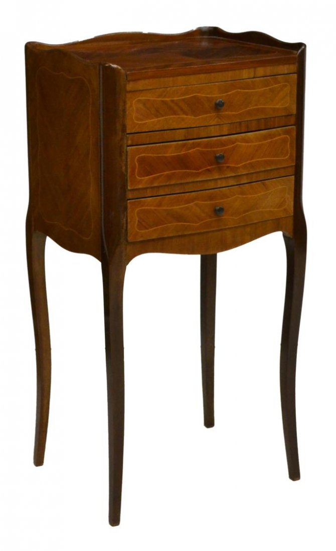 DIMINUTIVE INLAID SIDE TABLE OR BEDSIDE CABINET: Diminutive string inlaid side table, early 20th c., having matched wood top,over three drawers, raised on cabriole legs, approx 29.25"h, 14.5"w, 12"d Start Price: $80.00