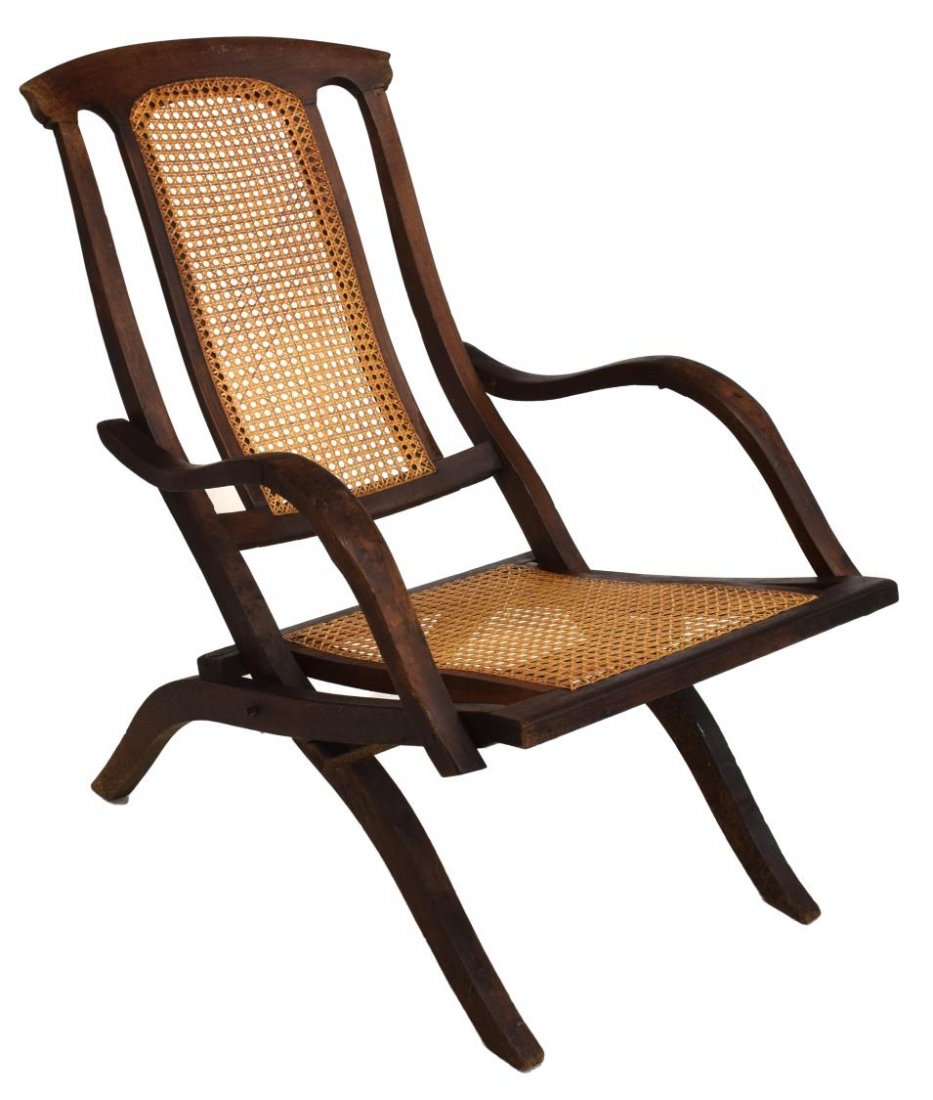 FOLDING ARM CHAIR: Folding arm chair, 19th c., curved top rail over caned back and seat, two arm rests, rising on four s-curve legs, folded: 48.5"h, 23.25"w, 6"d, unfolded: 33.5"h, 21.5"w, 35"d *Provenance: Estate of Ho