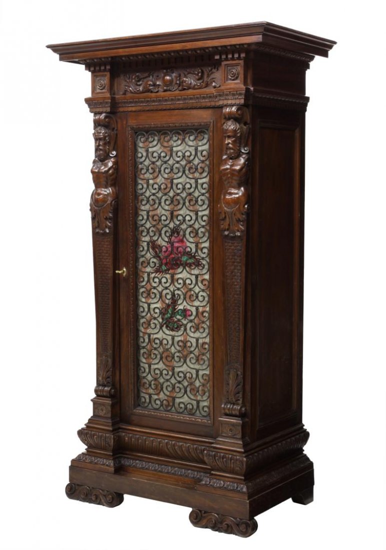 ITALIAN RENAISSANCE REVIVAL FIGURAL MUSIC CABINET: Italian Renaissance Revival figural carved music cabinet, late19th c. the corniced top with dentil molding and foliate carved frieze above three doors flanked by carved male and female figures, the do