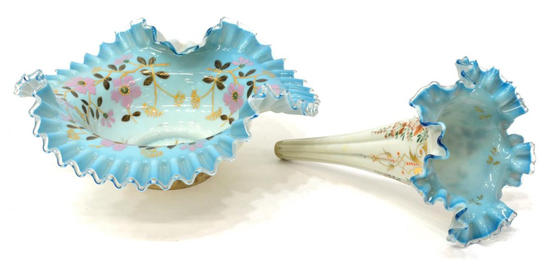 (2) VICTORIAN CASED BRIDES BASKET & EPERGNE FLUTE: (lot of 2) Victorian enameled cased and ruffled glass items: (1) brides basket, blue interior having polychrome enamel flowering vines, white exterior on a short silverplate mounted foot, ruffled rim 