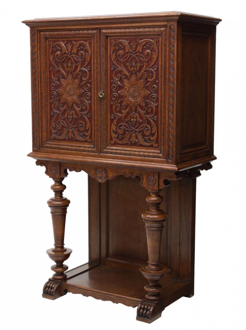 FRENCH OAK RENAISSANCE REVIVAL SERVER: French Renaissance Revival server, late 19th c., rectangular with a stepped cornice over two drawers , decorated with applied foliate carving, over the open base with turned supports on stylized claw 
