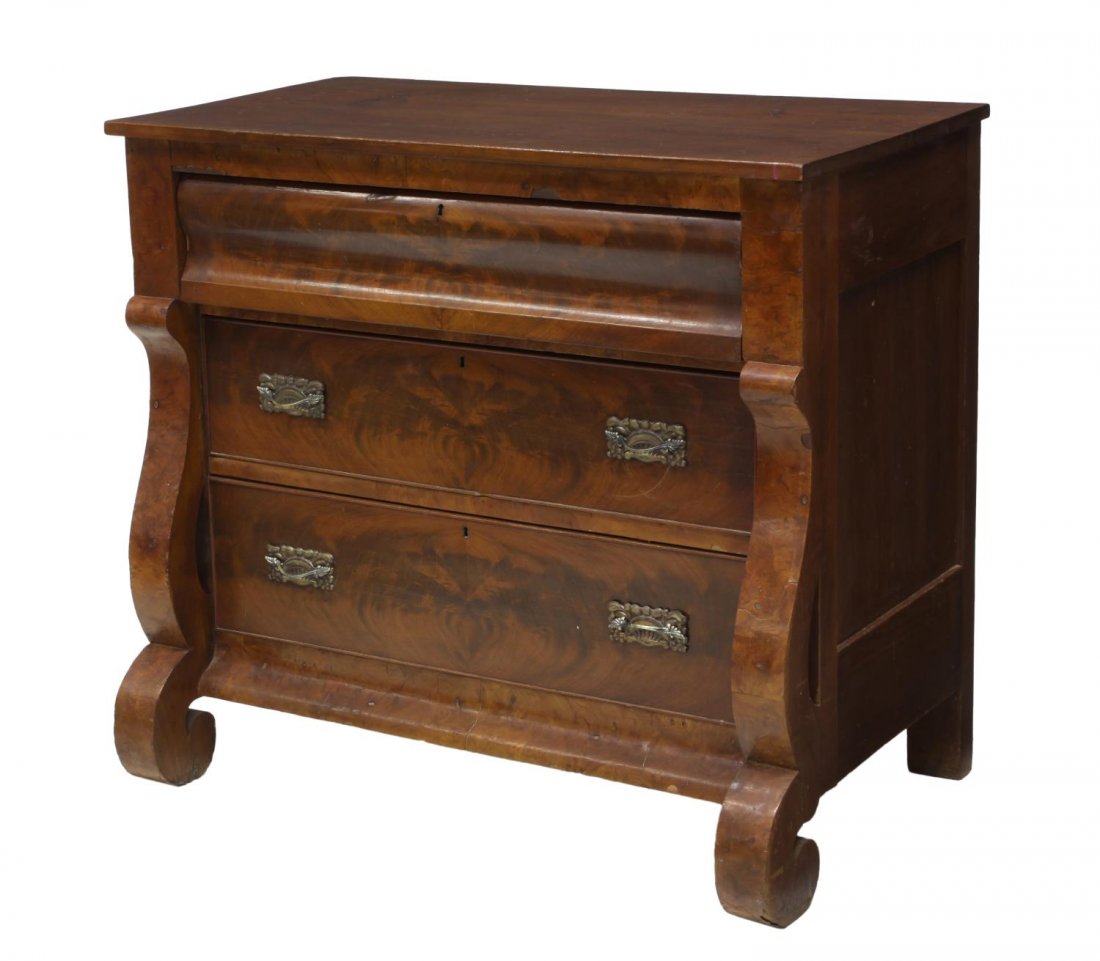 AMERICAN EMPIRE THREE DRAWER CHEST: American Empire period chest, 19th c., having three drawers flanked by wide scrolling columns with inward scrolled feet, later drawer pulls, 37"h, 41.5"w, 21.25"d *Provenance: Dreyfus Antiques, Austin
