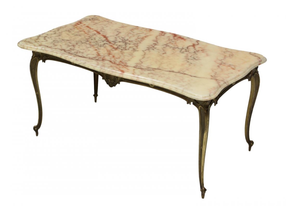 FRENCH MARBLE TOP COFFEE TABLE: French Louis XV style coffee table, 20th c., a shaped marble top rising on a metal frame with scroll foot cabriole supports, 16.5"h, 34.5"w, 19"d *Provenance: Dreyfus Antiques, Austin, Texas* Start Pr