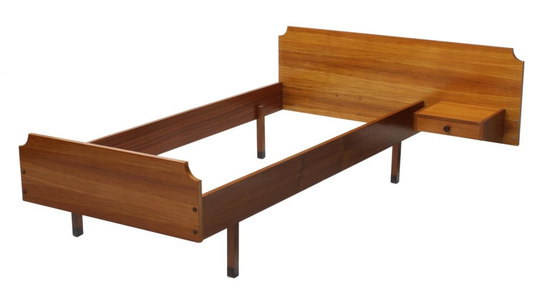 ITALIAN MID-CENTURY MODERN TEAKWOOD BED FRAME: Italian mid-century modern teakwood bed frame, c.1960, headboard having single shelf with drawer, rising on four legs, approx 28.75"h, interior: 78"l, 34"w Start Price: $80.00