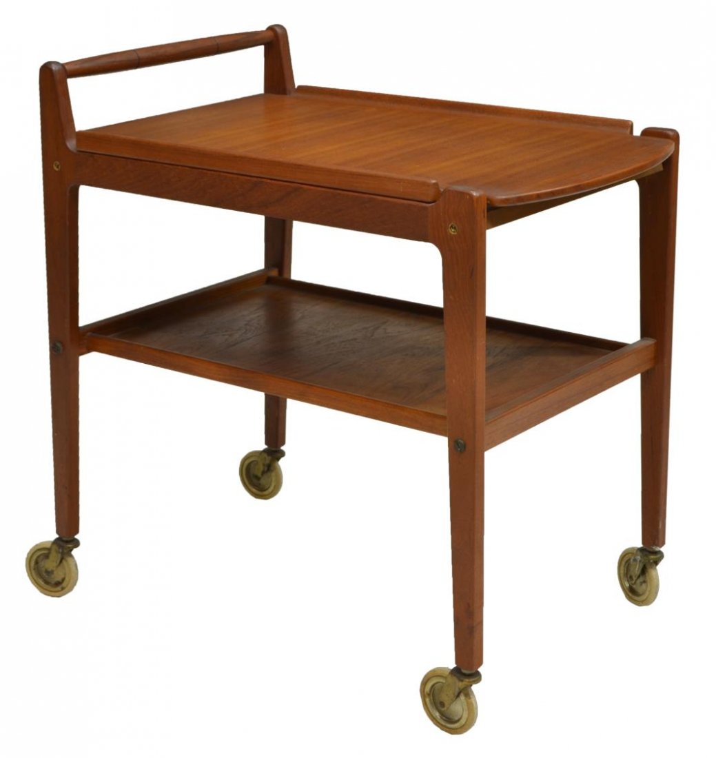 MID-CENTURY MODERN TEAK SERVICE CART, 20TH C.: Scandinavian design mid-century modern teak service cart, 20th c., having a turned handle, the plain top above a shelf, rising on squared tapered legs on casters, 29"h, 17"w, 27"d Start Price: $80.00