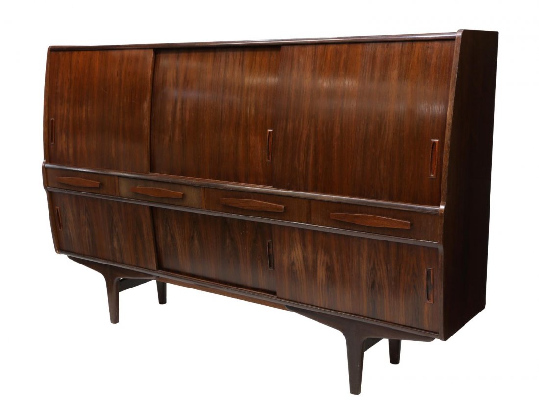 DANISH MID-CENTURY MODERN FITTED SIDEBOARD: Danish mid-century modern sideboard, c. 1950's/60's, three sliding doors open to central mirrored area with stylized shelf and two tray drawers, side doors conceal shelving, all above drawers, the cab