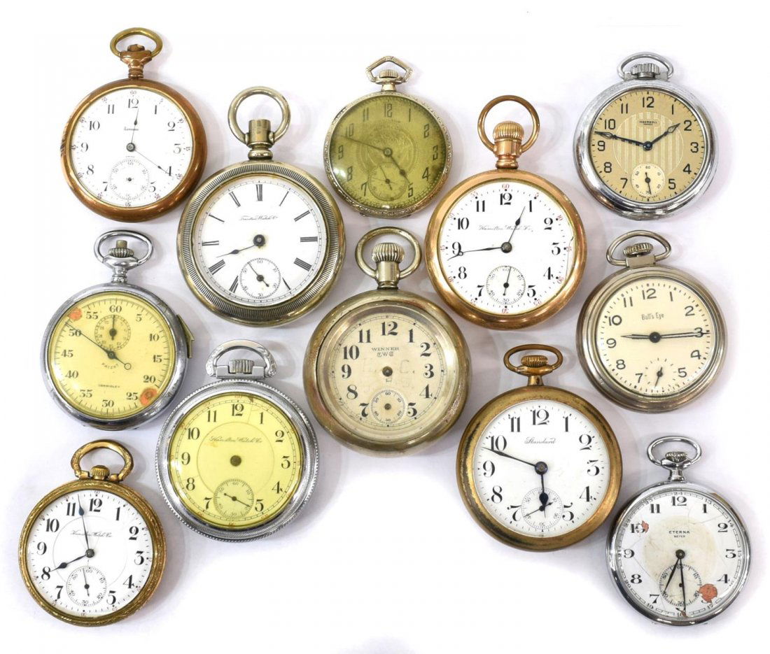 (12) POCKET WATCHES FOR PARTS OR REPAIR: (lot of 12) Miscellaneous pocket watches, gold gill and silver finish, all in poor condition, makers include, Hamilton, Westclox, Eterna, Standard, Trenton, Tavannes, Start Price: $40.00