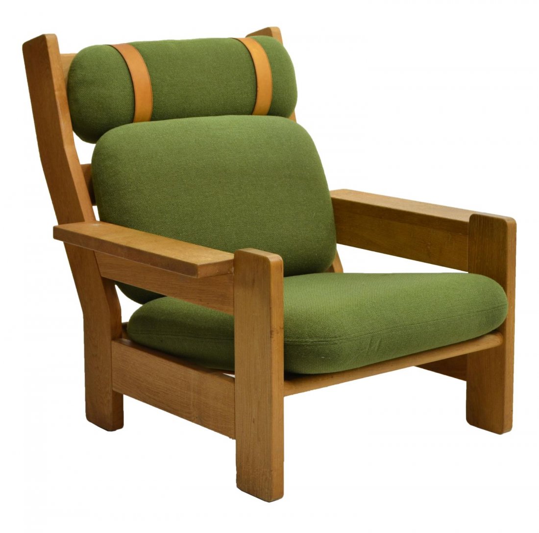 DANISH MODERN BEECHWOOD HIGH BACK ARMCHAIR, 1970S: Danish Modern Beechwood high back armchair, c. 1970s, with leather straps around the headrest cushion, with flat armrests, removable cushions, 36"h, 35"w, 36"d Start Price: $100.00