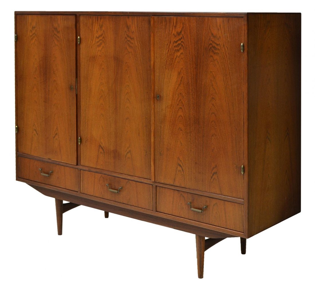 DANISH MID-CENTURY MODERN ROSEWOOD SIDEBOARD: Danish mid-century modern rosewood sideboard, having three sliding doors conceal shelves and pull out drawers, above three short drawers, rising on joined legs, 47"h, 55"w, 17.5"d Start Price: $400.00