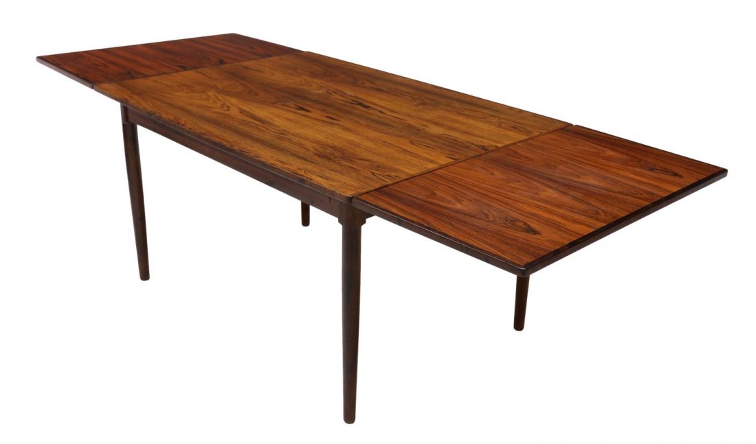 DANISH MID-CENTURY DRAW LEAF ROSEWOOD TABLE: Danish mid-century modern rosewood dining table, c. 1950's/60's, two draw leaves concealed on either end of the rectangular table, rising on cylindrical supports, table: 28.5"h, 50.75"l, 36.75"w, each