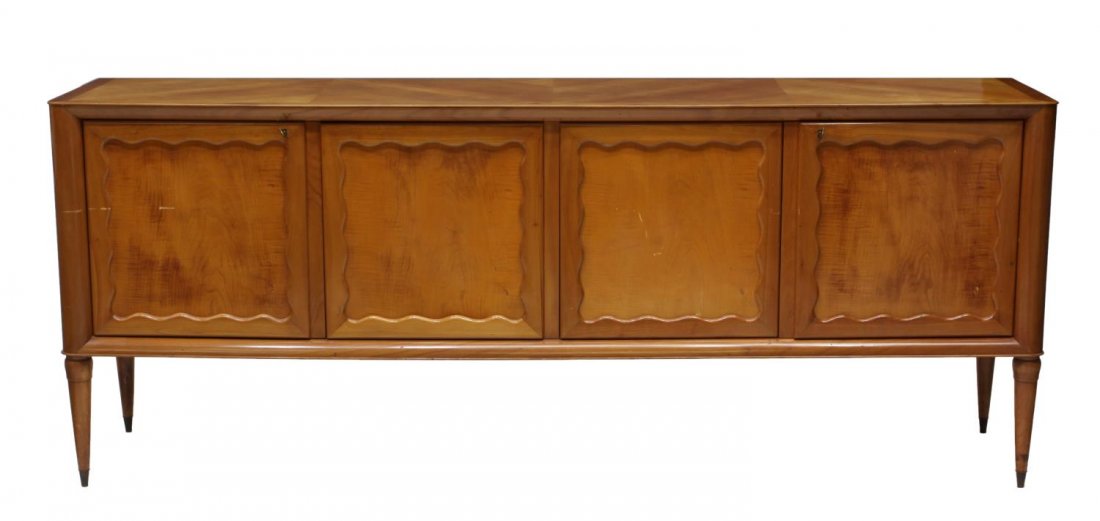 ITALIAN MID-CENTURY LONG SIDEBOARD: Italian mid-century sideboard, c. 1940's/50's., having a patterned top, over four scalloped paneled doors, rising on tapered turned supports with brass feet, 34.75"h, 87"w, 21"d Start Price: $200.00