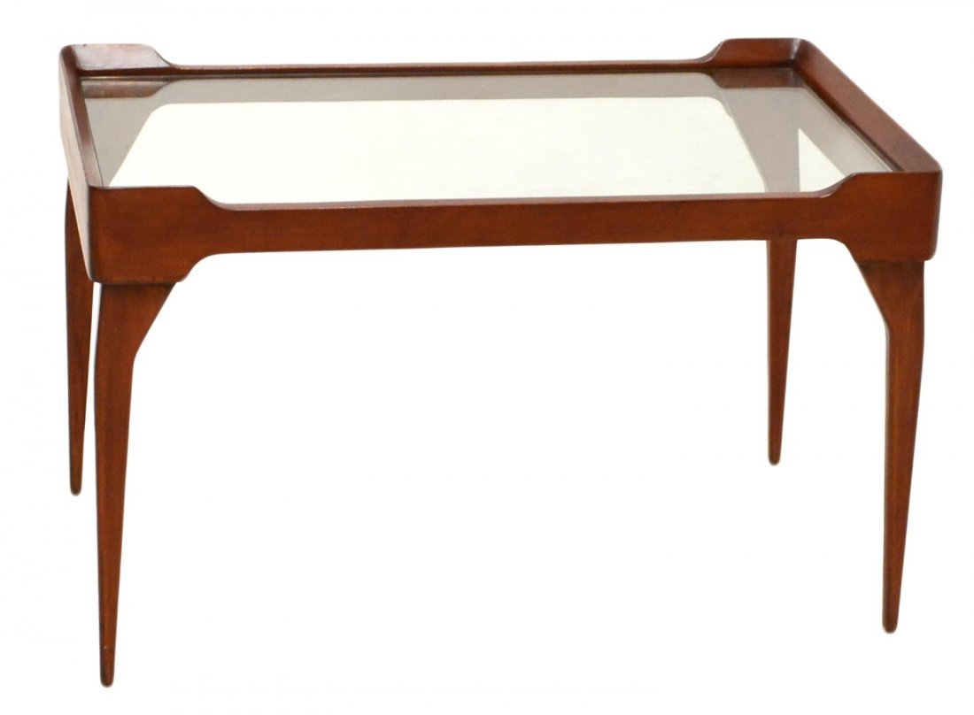 ITALIAN DESIGN MID-CENTURY MODERN COFFEE TABLE: Italian mid-century modern coffee table, in the manner of Ico Parisi (Italian, 1916-1996), c. 1950, dark teakwood frame holding a glass top, on tapered legs, approx 19.5"h, 31"w, 19.25"d Start Price: 