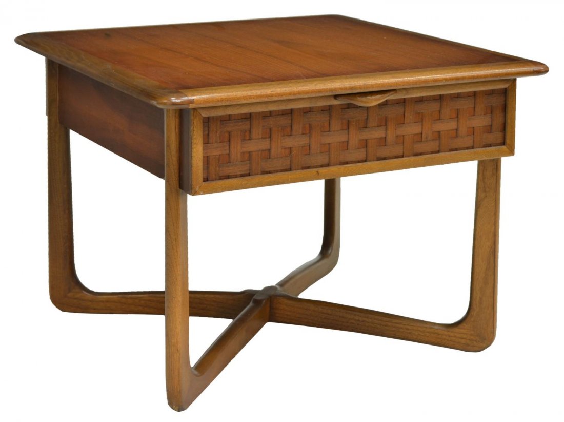 LANE MID-CENTURY MODERN TEAK SQUARE SIDE TABLE: Lane mid-century modern teak side table, the square top over a single drawer with woven facade, rising on cross stretcher base, 21"h, 26"w, 26"d Start Price: $60.00