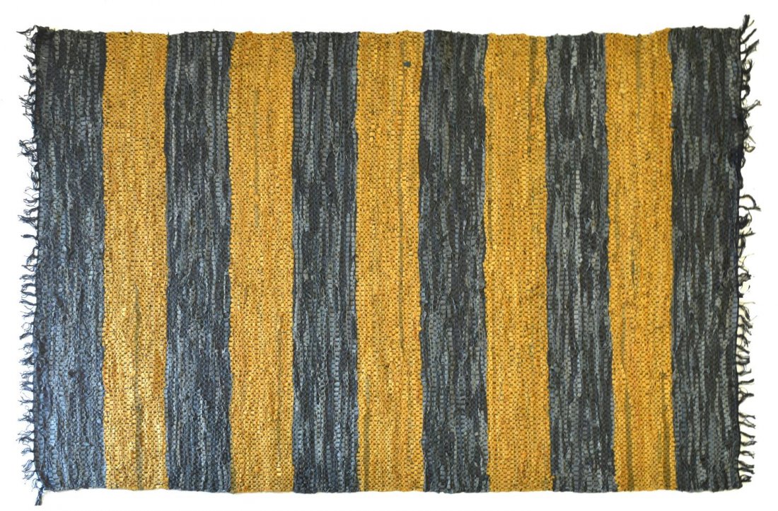 DANISH LEATHER RAG RUG 6'6" X 4'6": Danish leather rag rug, alternating tones of yellow and grey, approx. 6'6"l, 4'6"w Start Price: $80.00