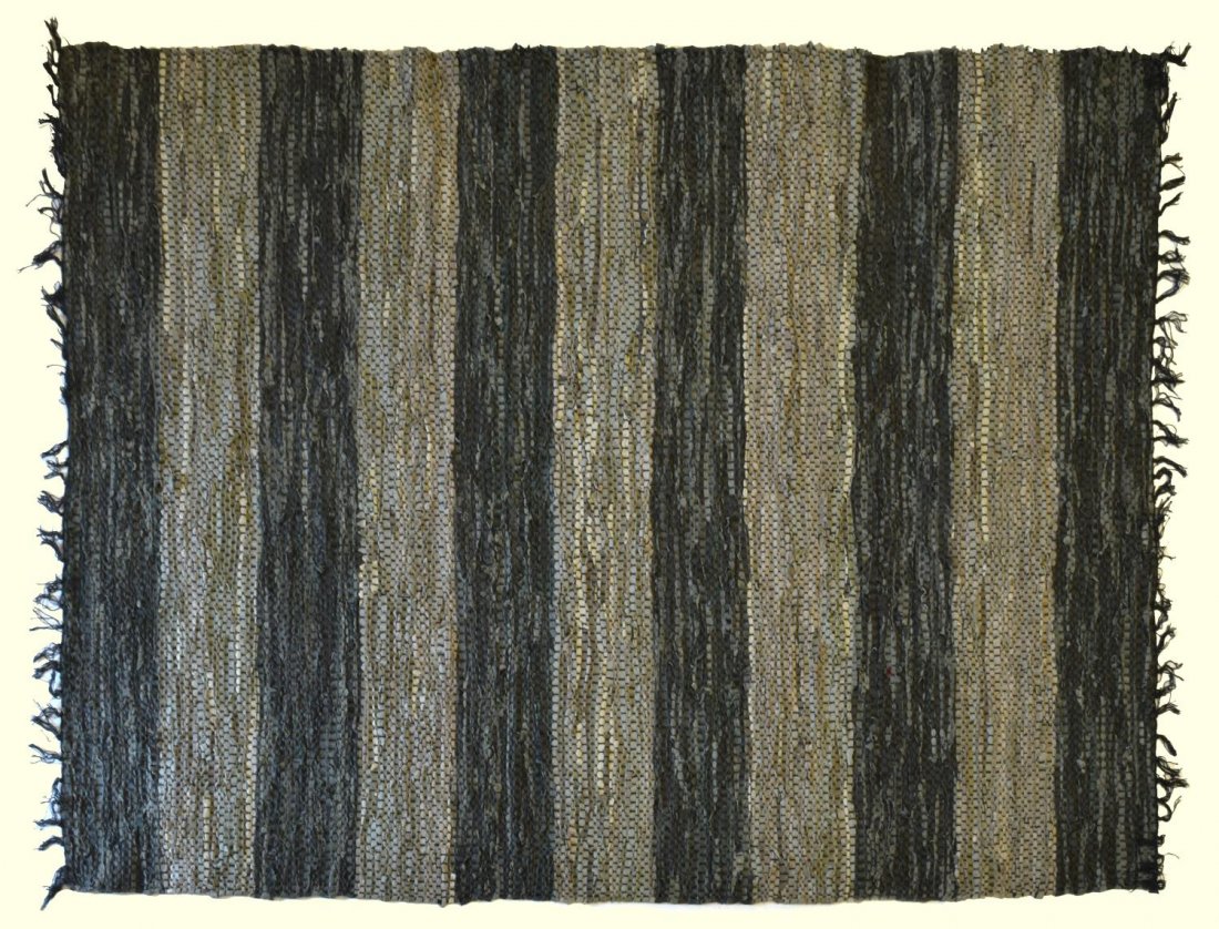 DANISH LEATHER RAG RUG 6'6" X 4'6": Danish leather rag rug, alternating tones of grey, approx. 6'6"l, 4'6"w Start Price: $80.00