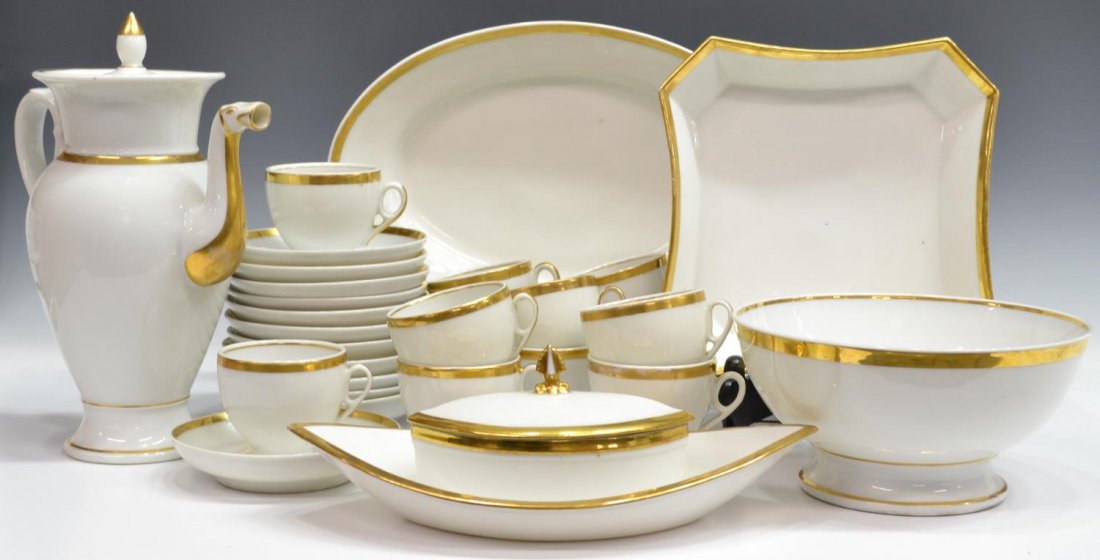 (29) OLD PARIS PORCELAIN PARCEL GILT DESSERT SET: (set of 29) Old Paris porcelain coffee and dessert service, gilt accents on a white ground, comprising: (1) lidded and handled coffee pot, figural spout molded as a dragon, 10.75"h; (12) cups, one wit