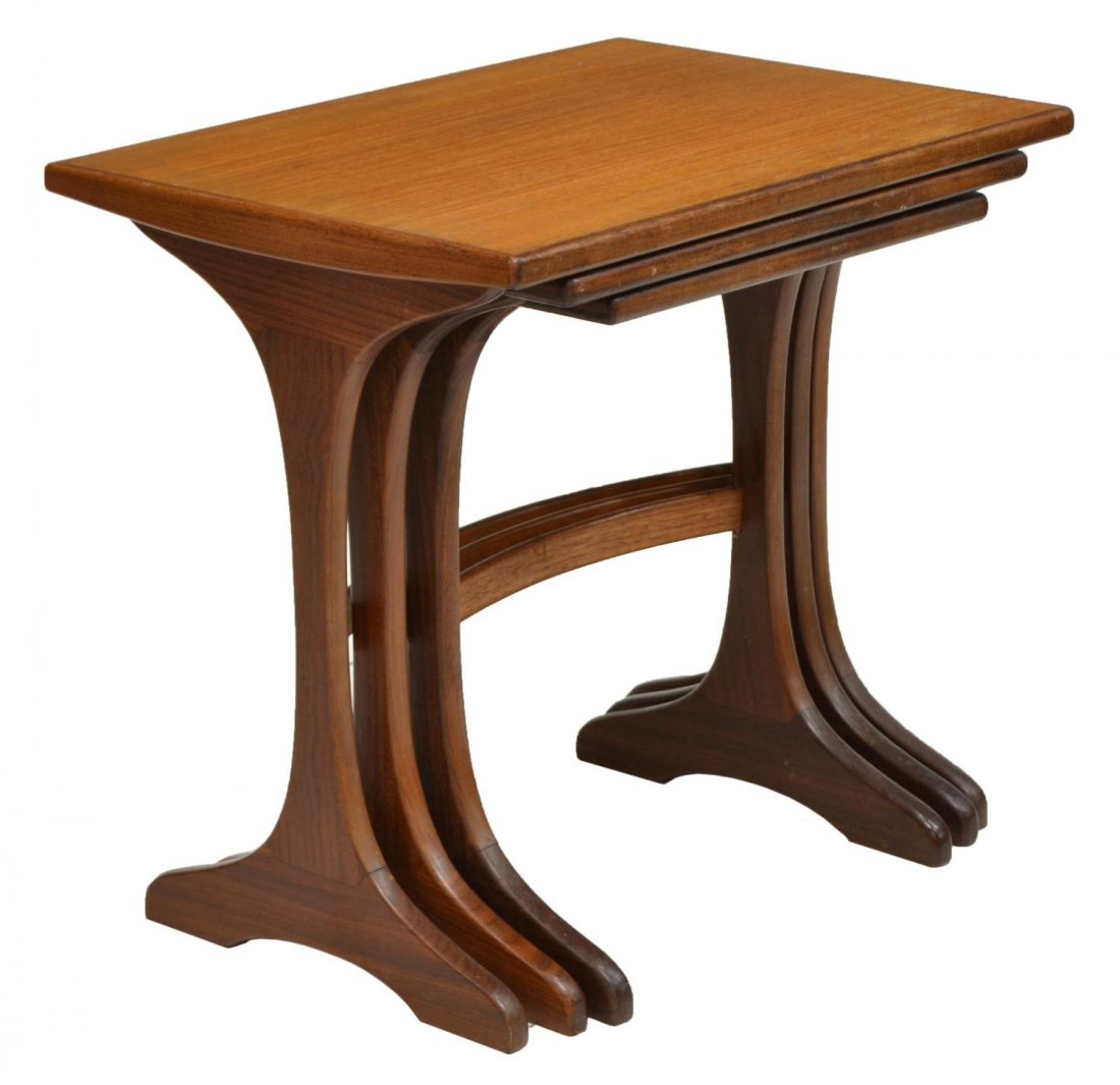 (3) MID-CENTURY MODERN TEAK NESTING TABLES, 20TH C: (set of 3) Mid-century modern teak wood nesting tables, 20th c., the two tone top over a trestle base, smallest: 19"h, 15"w, 14"d, largest: 20.5"h, 22"w, 16"d Start Price: $80.00