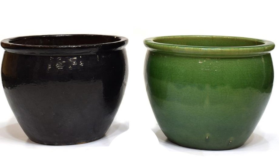(2) GLAZED ROUND EARTHENWARE PLANTERS: (lot of 2) Glazed earthenware planters, including: (1) black, unglazed interior, approx 15.5"h, 19.5"diam; (1) green, approx 15.75"h, 20"diam; 121.25lbs total Start Price: $50.00