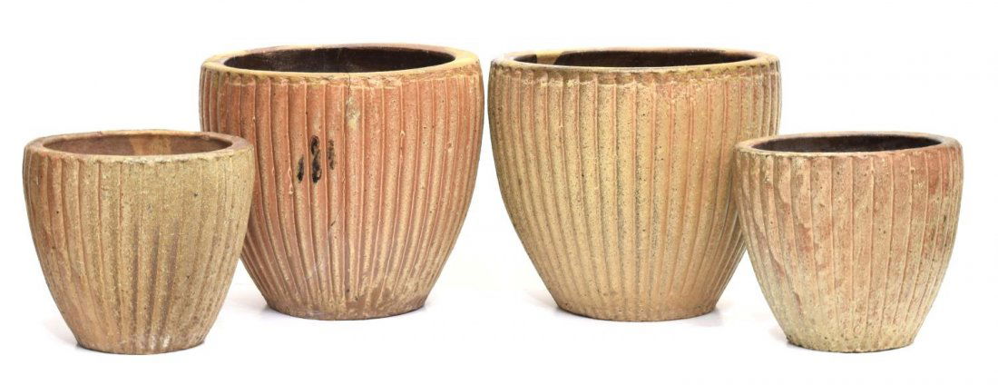 (4) REEDED EARTHENWARE PLANTERS OF VARIED SIZE: (lot of 4) Glazed earthenware planters, each having ribbed exteriors, including: (2) tall, fracture to rim of one, approx 13"h, 14.5"diam; (2) short, approx 9.75"h, 11"diam; 83lbs total Start Price: $