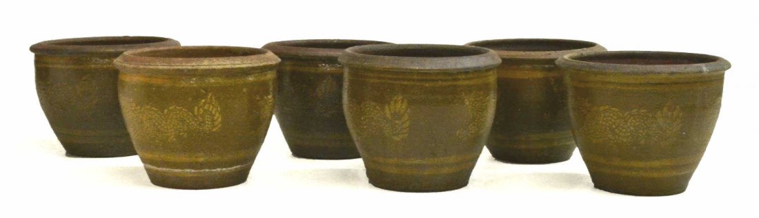 (6) GLAZED EARTHENWARE DRAGON PLANTERS: (lot of 6) Glazed earthenware planters, bodies painted with dragons, each approx 9"h, 12.25"diam, 60lbs total Start Price: $40.00