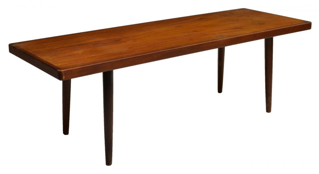 DANISH MID-CENTURY MODERN TEAKWOOD COFFEE TABLE: Danish mid-century modern teakwood coffee table, c. 1950's/60's, of rectangular form on tapered legs, approx 19.5"h, 59.75"l, 20.25"w Start Price: $100.00