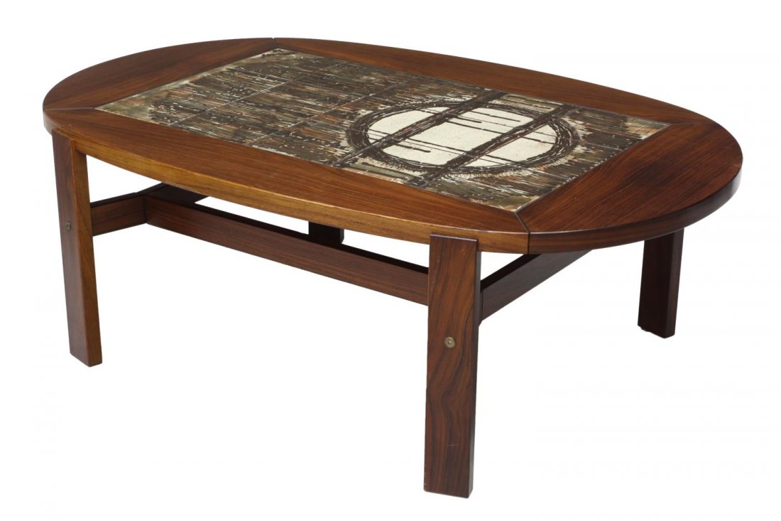DANISH MID-CENTURY MODERN TILE TOP COFFEE TABLE: Danish modern oversized teakwood coffee table, c. 1970's, the large oval top centering an arrangement of art tiles, signed in the lower corner, all on four legs joined by stretchers, 20.5"h, 59"l, 38"