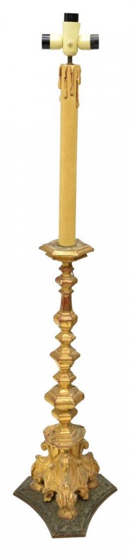 ITALIAN CARVED GILTWOOD STANDING CHURCH LIGHT: Italian giltwood carved altar light, 19th c., now electrified with faux candle cover and three sockets, approx 60"h Start Price: $200.00