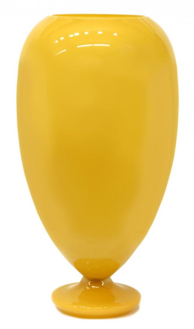 LARGE YELLOW ART GLASS VASE LAMP: Large yellow art glass lamp, the ovoid vase form body tapering down to a pedestal foot, interior fitted with lighting, drilled through base, 27"h, 15" diam., 17.75lbs Start Price: $80.00