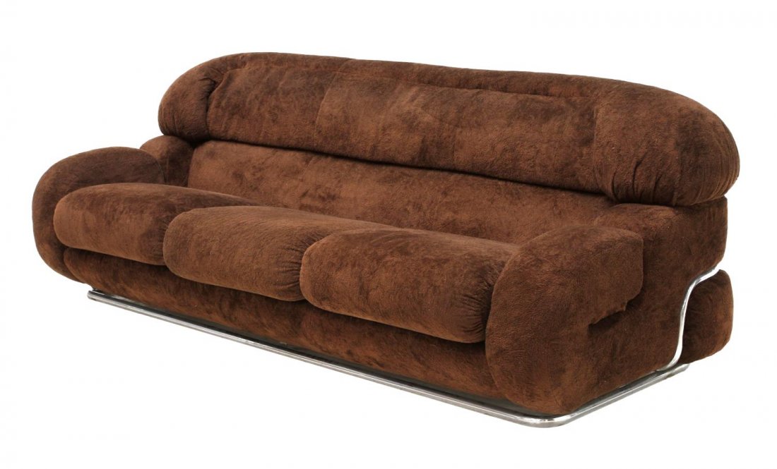 ITALIAN MID-CENTURY MODERN SOFA: Italian mid-century modern sofa, c. 1960's, an oversize form with brown upholstery, three loose cushions, held and accented by the tubular chrome steel frame, 33"h, 86"l, 34"d Start Price: $200.00