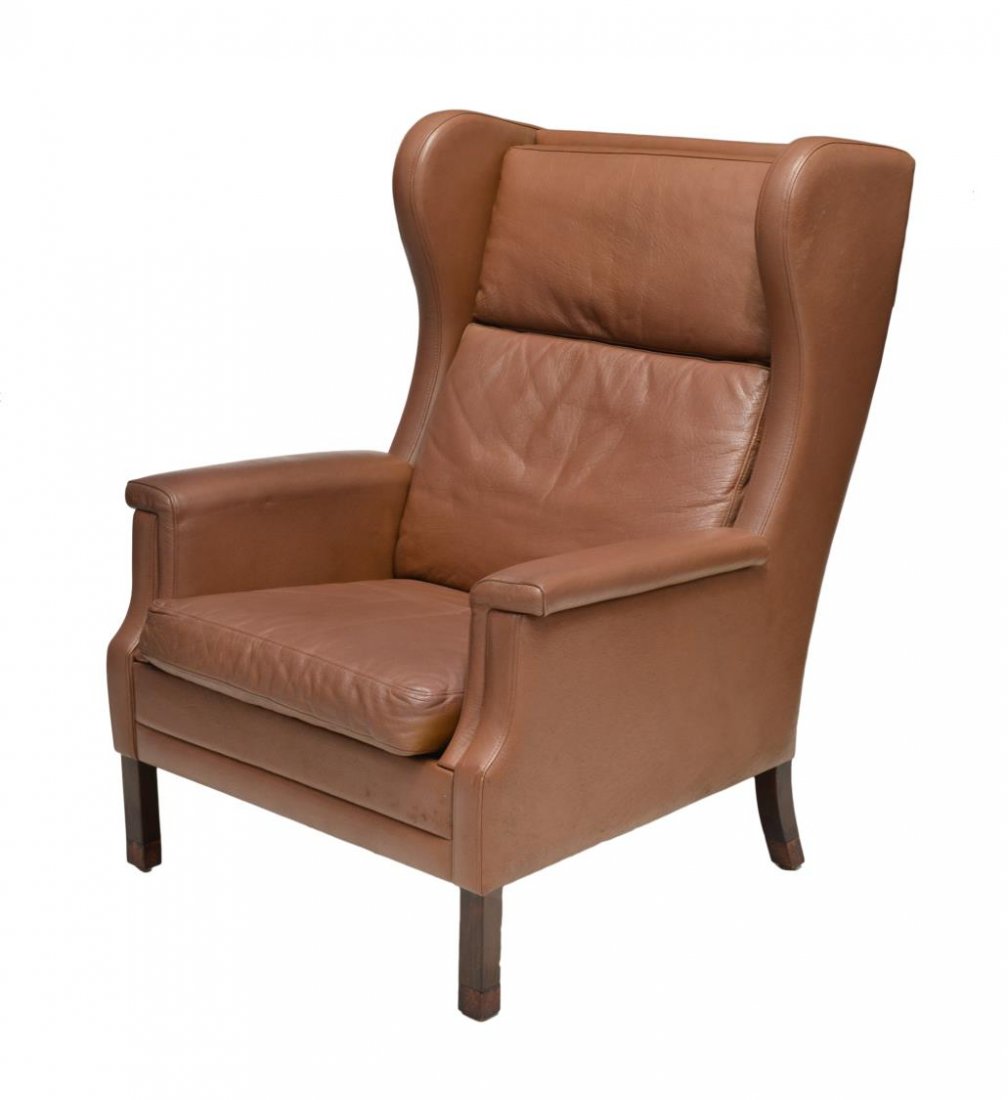 DANISH MID-CENTURY LEATHER WINGBACK ARMCHAIR: Danish mid-century modern wingback armchair, 1960's, leather upholstery with removable back and seat cushions, rising on squared legs, 41.75"h, 31.75"w, 38"d Start Price: $150.00