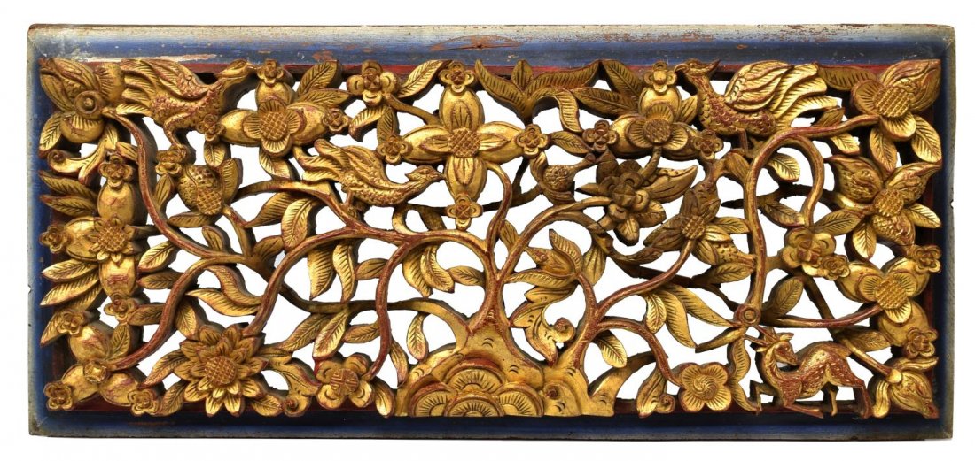 ASIAN PARCEL GILT CARVED WOOD PLAQUE: Asian parcel gilt carved wood plaque, the pierced panel decorated with flowering tree and birds, with blue and white painted border,31"h, 14.5"w, 2"d, 10.5lbs Start Price: $60.00