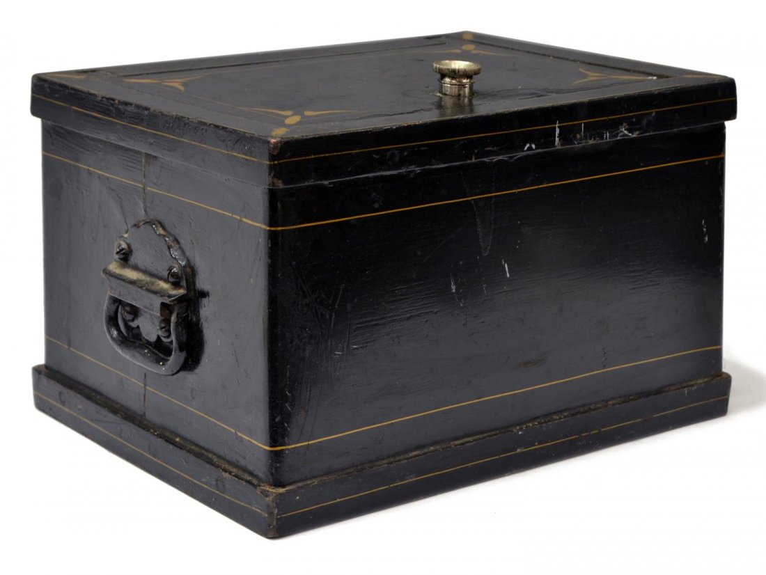 SMALL ANTIQUE PARCEL GILT IRON SAFE STRONG BOX: Antique iron strong box, the diminutive safe having parcel gilt accents, side carrying handles, wood lined interior, some loss to black paint, retaining two keys marked Bob Grimble Howe, locking mecha