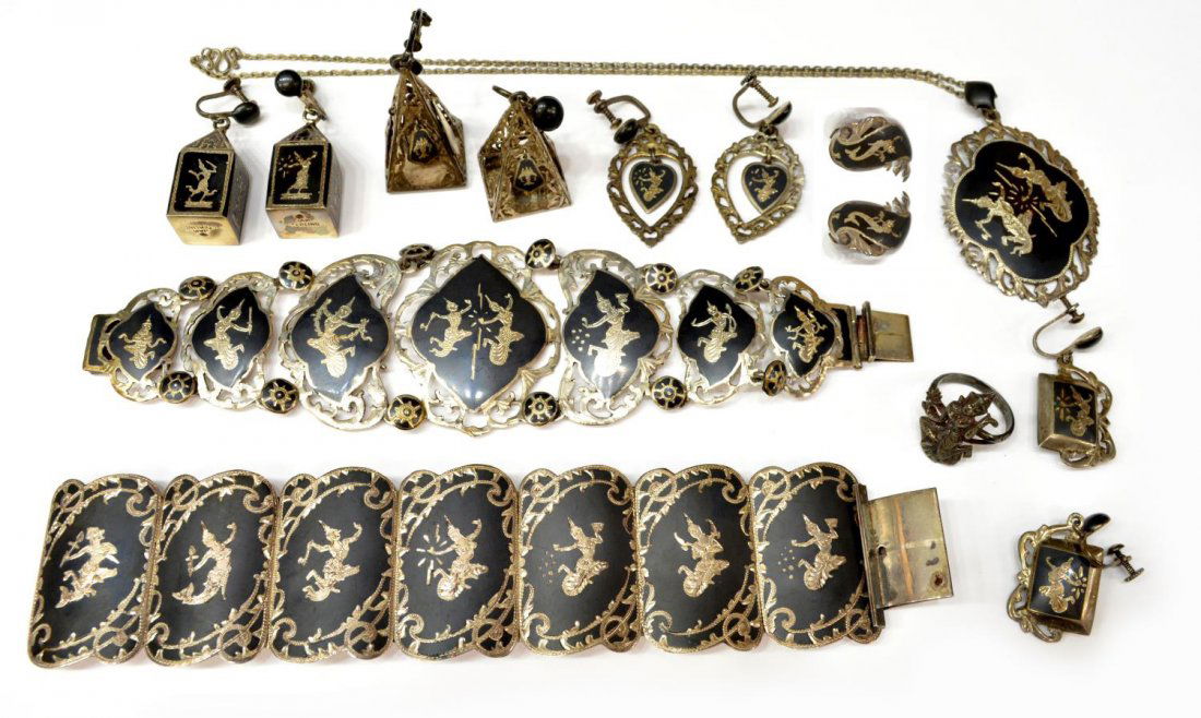 (14) GROUP SIAM STERLING SILVER ESTATE JEWELRY: (lot of 14) Siam sterling silver jewelry, 20th c., comprising: (9) clip-on dangle earrings, decorated with figures, stamped, (five) pair, largest: 2"l; (2) wide link bracelets with etched figural rese